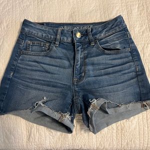 Medium wash ultra stretch high rise denim shorts
